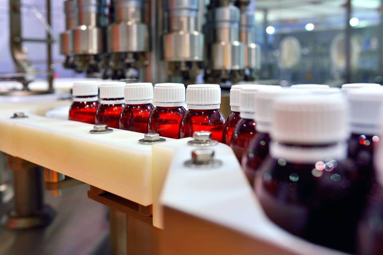 Close-up of an oral solution in a production line